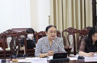 Bà Nguyễn Thị Cúc phát biểu tại một hội thảo do Báo Pháp luật Việt Nam tổ chức. (Ảnh T.Oanh)
