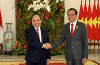 Chủ tịch nước Nguyễn Xuân Phúc và Tổng thống Joko Widodo. Ảnh: VGP