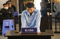 Bị cáo Nguyễn Quang Hùng tại phiên tòa xét xử.