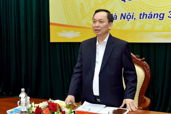 Thống đốc Ngân hàng Nhà nước Đào Minh Tú chủ trì cuộc họp báo. 