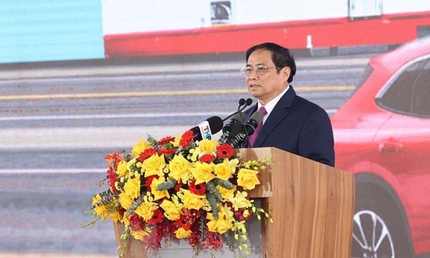 Thủ tướng Phạm Minh Chính phát biểu tại lễ xuất xe ôtô điện Vinfast sang thị trường Hoa Kỳ. (Ảnh: Dương Giang/TTXVN)