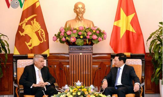 Phó Thủ tướng, Bộ trưởng Ngoại giao Phạm Bình Minh hội kiến với Thủ tướng Sri Lanka Ranil Wickremesinghe.