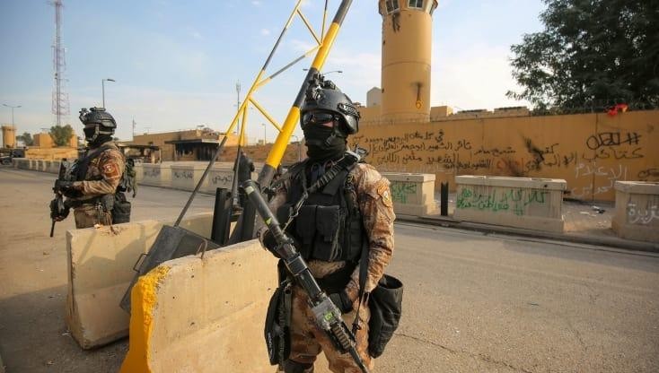 Lực lượng cảnh sát chống khủng bố Iraq trước Đại sứ quán Mỹ tại Baghdad hôm 2/1.