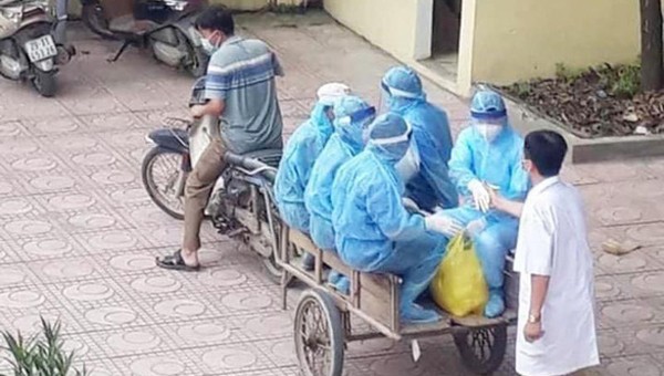 lCác nhân viên y tế tại xã Đồng Lạc, huyện Chương Mỹ, Hà Nội đi khử khuẩn tại khu vực được khoanh vùng chống dịch, sau khi xã này ghi nhận 2 ca bệnh liên quan đến Bệnh viện K hôm 7/5.  Ảnh: Mạng xã hội

