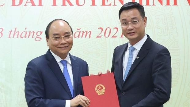Thủ tướng Nguyễn Xuân Phúc trao Quyết định bổ nhiệm cho ông Lê Ngọc Quang. (Ảnh: Thống Nhất/TTXVN)