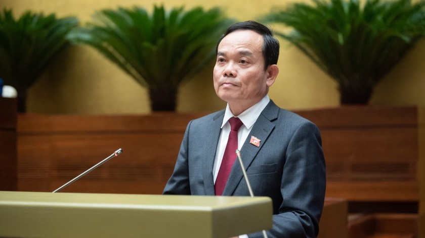 Phó Thủ tướng Trần Lưu Quang trình bày Báo cáo. (Ảnh: Quochoi.vn)