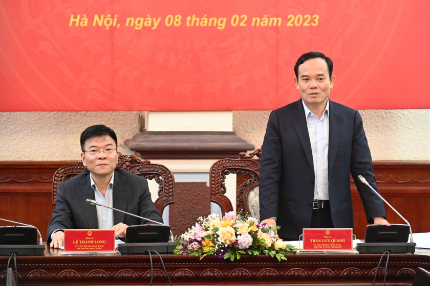 Phó Thủ tướng Trần Lưu Quang và Bộ trưởng Lê Thành Long tại buổi làm việc.