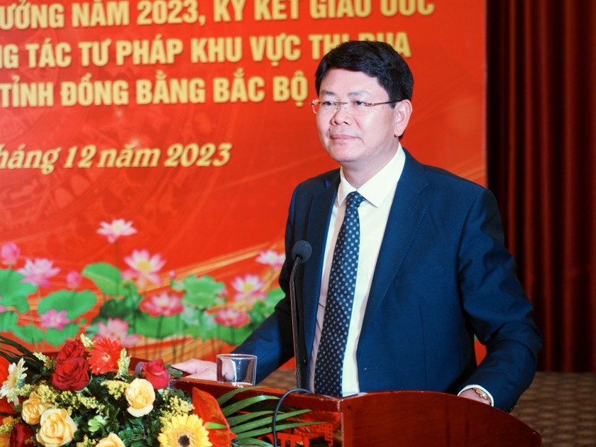 Thứ trưởng Bộ Tư pháp Nguyễn Thanh Tịnh phát biểu tại Hội nghị.