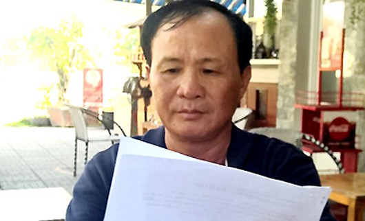 Ông Nguyễn Văn Tấn - chủ quán cà phê Xin Chào