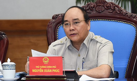 Thủ tướng Nguyễn Xuân Phúc: Đừng coi doanh nghiệp là đối tượng quản lý mà là đối tượng phục vụ - Ảnh: VGP/Quang Hiếu