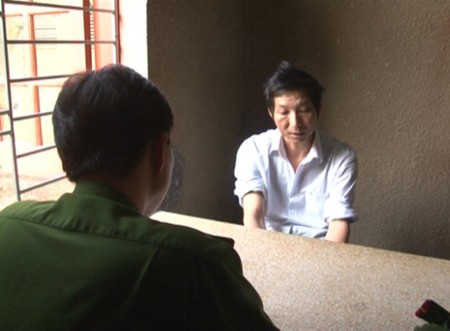 Hung thủ Lê Văn Minh tại cơ quan điều tra
