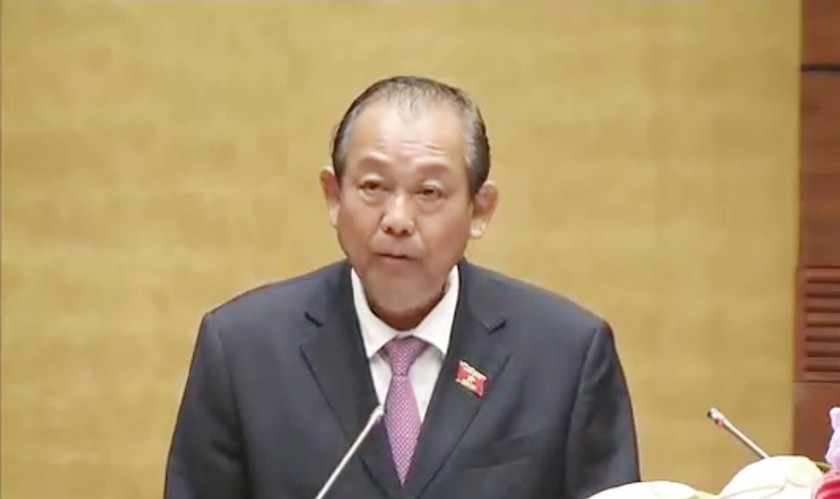 Phó Thủ tướng Thường trực Trương Hòa Bình báo cáo trước Quốc hội trong phiên khai mạc Kỳ họp thứ 3, Quốc hội khóa XIV.