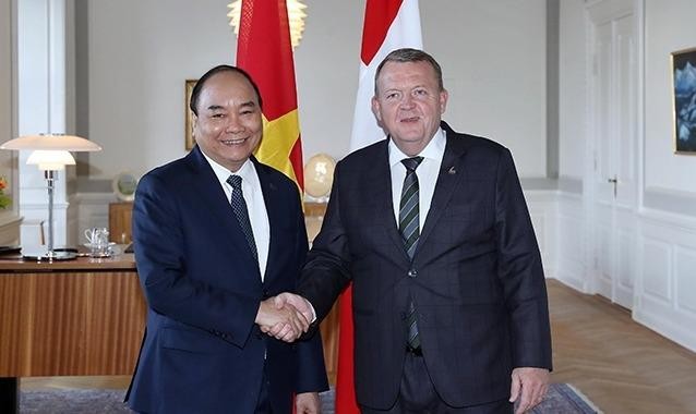 Thủ tướng Nguyễn Xuân Phúc và Thủ tướng Ðan Mạch L.Ra-xmu-xen. Ảnh: Thống Nhất (TTXVN)