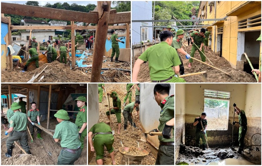 Công an tỉnh Nghệ An giúp người dân khắc phục hậu quả mưa lũ.