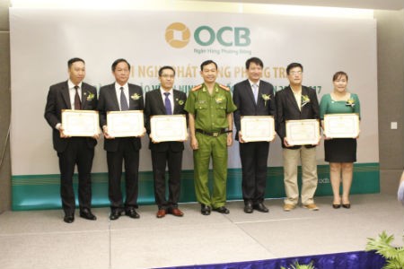 OCB nhận bằng khen về phong trào bảo vệ an ninh Tổ quốc