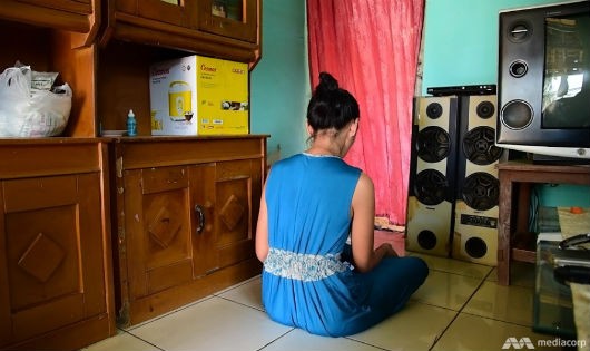 Một gái bán dâm ở Indonesia. Ảnh: CNA