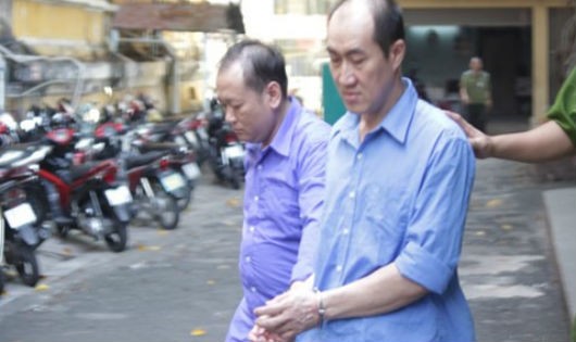 Các bị cáo Nguyễn Tấn Huy và Huỳnh Thanh Vũ. Ảnh ANTD