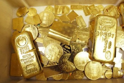 Giá vàng đang tiến rất gần mốc 1.200 USD. Ảnh: AFP