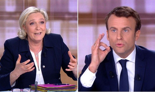 Đối thủ cực hữu Marine Le Pen và ứng cử viên độc lập Emmanuel Macron (phải)