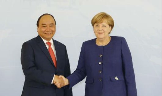 Thủ tướng Nguyễn Xuân Phúc và Thủ tướng Đức Merkel tại hội đàm. Ảnh: TTXVN