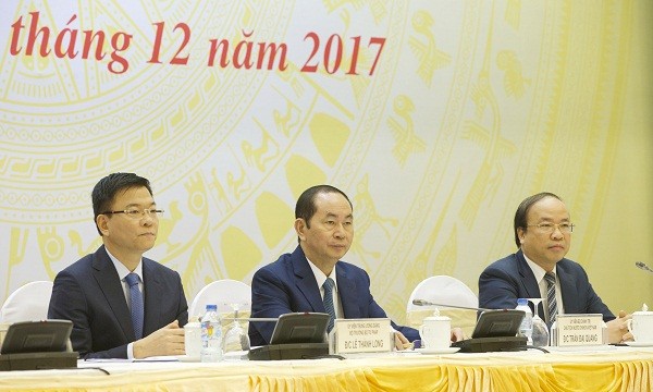 Chủ tịch nước Trần Đại Quang (giữa), Bộ trưởng Bộ Tư pháp Lê Thành Long (trái)  và Thứ trưởng Bộ Tư pháp Phan Chí Hiếu (phải)