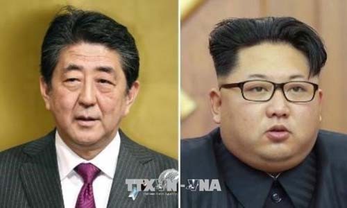 Thủ tướng Nhật Bản Shinzo Abe (trái) và Nhà lãnh đạo Triều Tiên Kim Jong-un. Ảnh: Kyodo/TTXVN