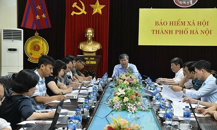 Một cuộc họp giữa BHXH TP Hà Nội với các Sở ngành liên quan để bàn giải pháp xử lý 10 doanh nghiệp nợ BHXH kéo dài. Ảnh ANTĐ