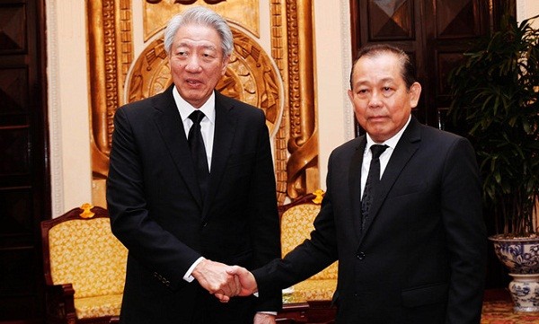 Phó Thủ tướng Trương Hòa Bình tiếp Phó Thủ tướng Singapore Tiêu Chí Hiền. Ảnh: VGP/Lê Sơn