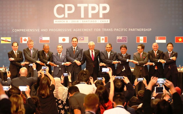 Đại diện các quốc gia thành viên CPTPP chụp ảnh lưu niệm sau lễ ký kết hồi tháng 3. Ảnh: Reuters/Dân trí