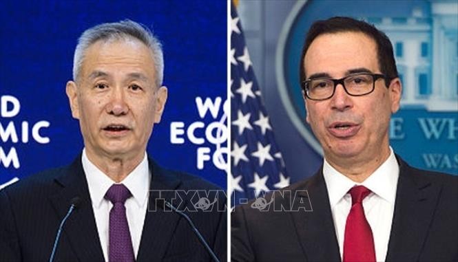 Phó Thủ tướng Trung Quốc Lưu Hạc (trái) và Bộ trưởng Tài chính Mỹ Steven Mnuchin (phải). Ảnh: China Plus/TTXVN