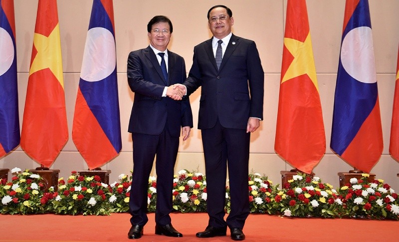Phó Thủ tướng Trịnh Đình Dũng và Phó Thủ tướng Chính phủ Lào Sonexay Siphandone. Ảnh: VGP