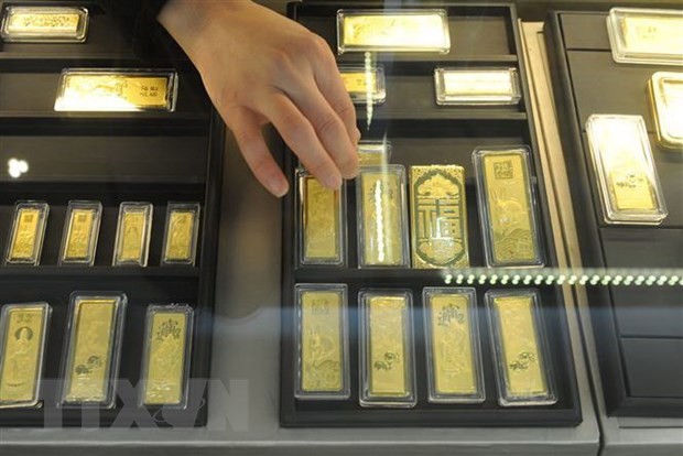 Vàng miếng được bày bán tại một cửa hàng ở tỉnh An Huy, Trung Quốc. (Nguồn: AFP/TTXVN)