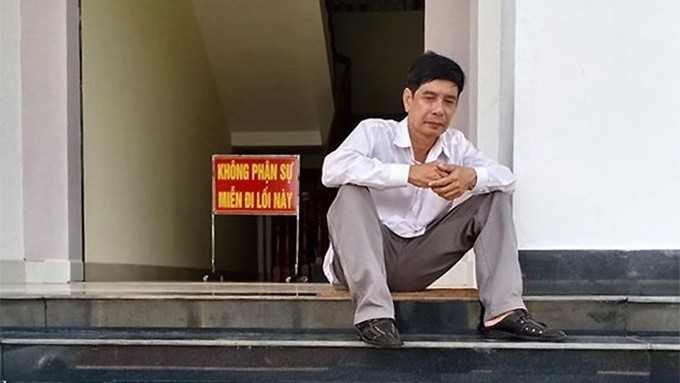 Ông Lương Hữu Phước ngồi tại TAND tỉnh Bình Phước trước khi HĐXX phúc thẩm tuyên án