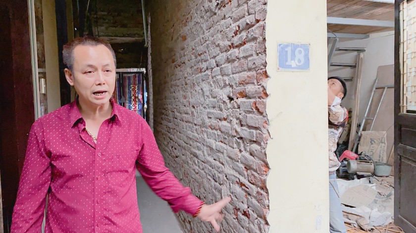 Ông Quang cho rằng căn nhà trước khi được cấp phép nâng tầng không kết cấu khung cột bê tông cốt thép chịu lực. 