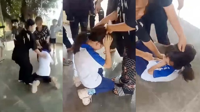 Nữ sinh ở Hà Nội bị các bạn đánh hội đồng, quay video phát lên mạng xã hộI. (Ảnh chụp màn hình clip)