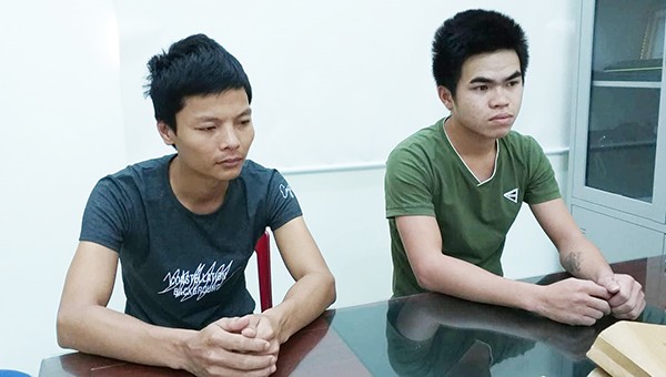 Lê Xuân Hải (trái) Nguyễn Cảnh Quang (phải) tại CQĐT.