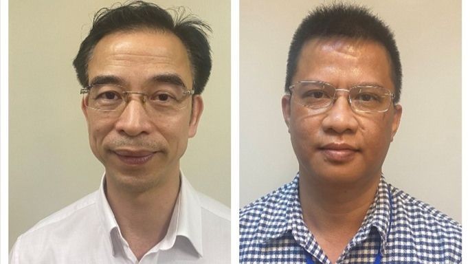 Ông Nguyễn Quang Tuấn (trái) và Nguyễn Đức Đảng thời điểm mới bị bắt. Ảnh: Bộ Công an