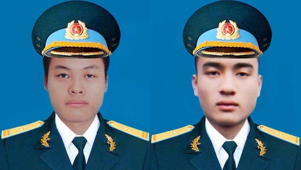 Thiếu tá Lê Xuân Trường (bên trái) và Thiếu úy Đào Văn Long.