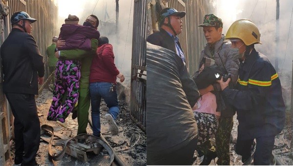 Công an Hà Nội nỗ lực giải cứu người dan mắc kẹt trong đám cháy.