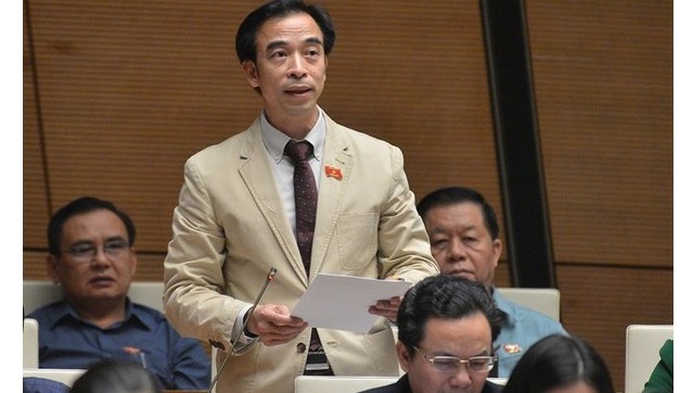 Ông Nguyễn Quang Tuấn phát biểu tại một kỳ họp. Ảnh: Chinhphu.vn