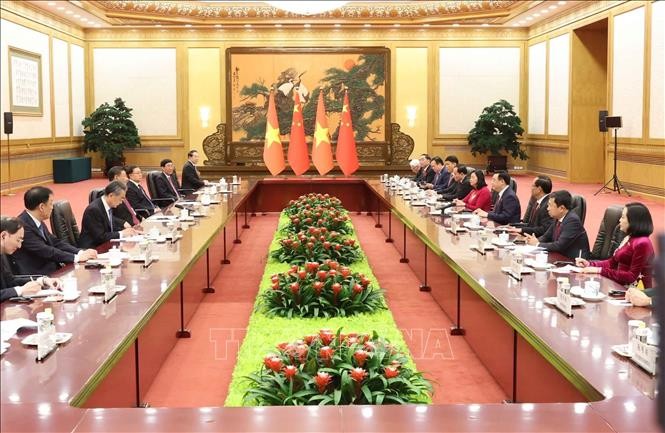 Chủ tịch Quốc hội Vương Đình Huệ hội kiến Tổng Bí thư, Chủ tịch nước Trung Quốc Tập Cận Bình. Ảnh: Nhan Sáng/TTXVN