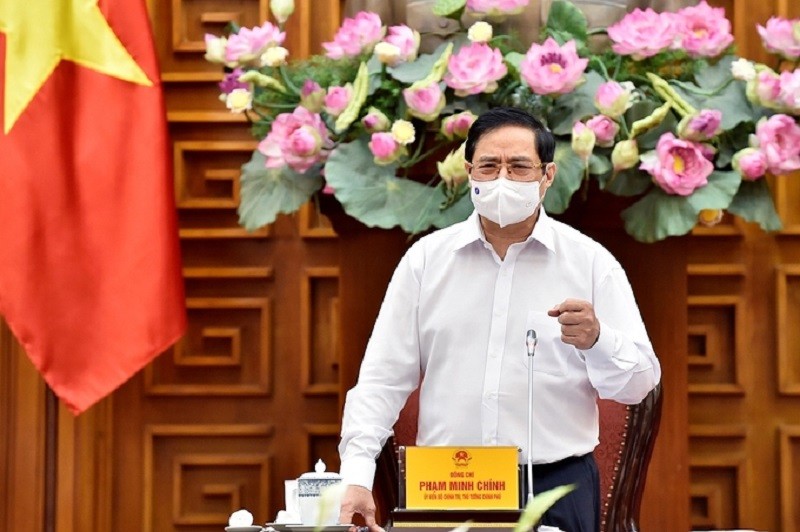 Thủ tướng Phạm Minh Chính trong buổi làm việc với Bộ Xây dựng ngày 18/5. Ảnh: VGP.