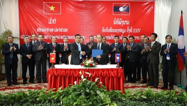 Việt Nam-Lào ký kết văn bản tiếp tục phối hợp tìm kiếm, quy tập hài cốt liệt sĩ mùa khô 2019-2020.