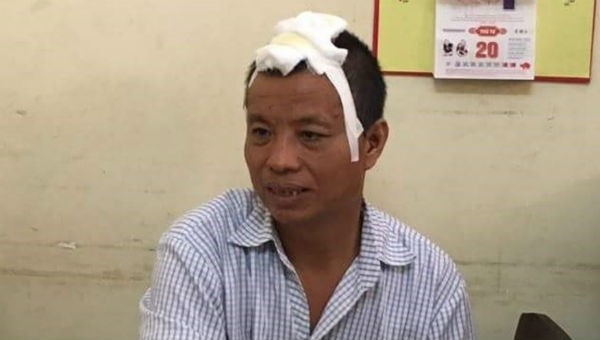Nguyễn Xuân Tiến khi bị bắt giữ (ảnh: Lao Động)