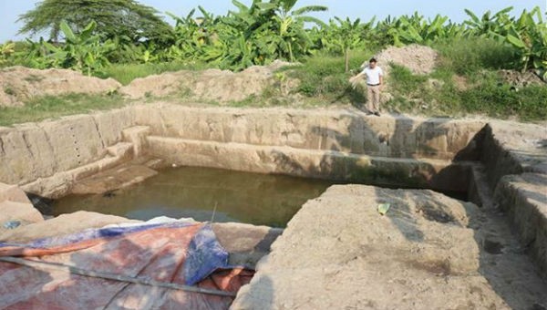 Hố thám sát của các nhà khảo cổ khai quật nghiên cứu khảo cổ học cụm di chỉ Vườn Chuối năm 2019.  Ảnh TTXVN.