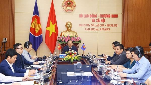 Đoàn Việt Nam do Bộ trưởng Bộ LĐ-TB&XH Đào Ngọc Dung làm Trưởng đoàn (Ảnh: Tống Giáp).