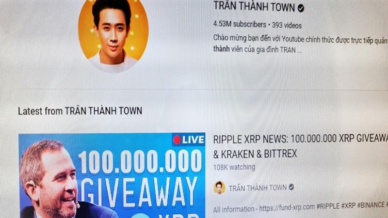 Trang YouTube của Trấn Thành khi đang bị hack, thực hiện livestream tặng tiền ảo.