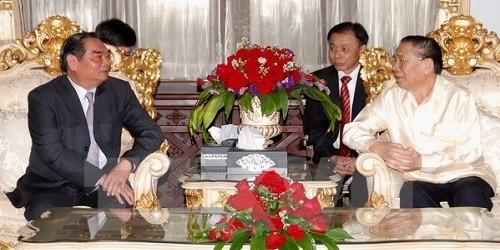 Tổng Bí thư, Chủ tịch nước Lào Chummaly Sayasone tiếp Thường trực Ban Bí thư Lê Hồng Anh. (Ảnh: Phạm Kiên/TTXVN)