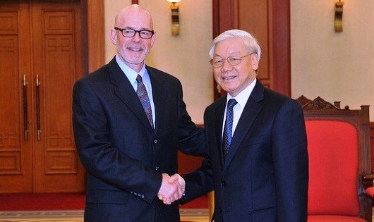 Tổng Bí thư Nguyễn Phú Trọng và Chủ tịch John Bachtell tại buổi tiếp. Ảnh: TTXVN.