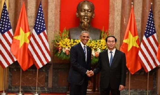Chủ tịch nước Trần Đại Quang tiếp đón Tổng thống Obama.